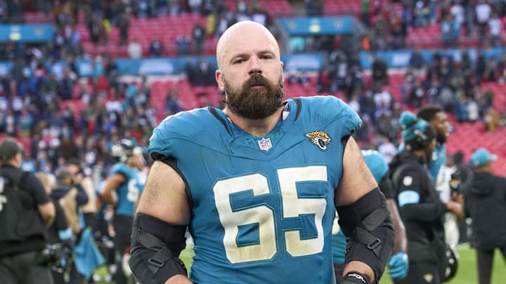 Oct 20, 2024; London, United Kingdom; Jacksonville Jaguars center Mitch Morse (65) leaves the field after the game against the New England Patriots  during an NFL International Series game at Wembley Stadium. Mandatory Credit: Peter van den Berg-Imagn Images
