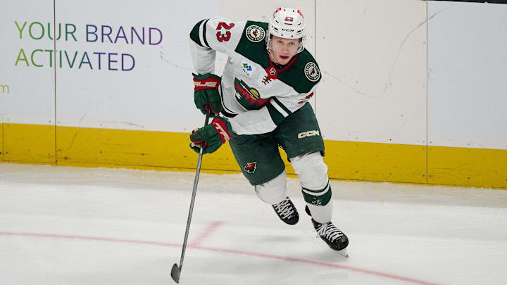 Jan 11, 2025; San Jose, California, USA; Minnesota Wild center Marco Rossi (23) plays the puck against the San Jose Sharks during the third period at SAP Center at San Jose. Mandatory Credit: Robert Edwards-Imagn Images Jan 11, 2025; San Jose, California, USA; Minnesota Wild center Marco Rossi (23) plays the puck against the San Jose Sharks during the third period at SAP Center at San Jose. Mandatory Credit: Robert Edwards-Imagn Images