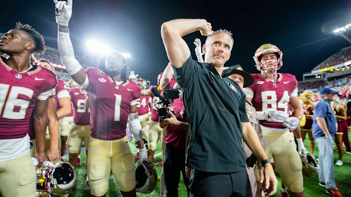 Sep 5, 2023; Orlando, Florida, USA; Florida State Seminoles head coach Mike Norvell celebrates with his team on their 45-24 victory over the LSU Tigers at Camping World Stadium on Sunday, Sept. 3, 2023. Mandatory Credit: Alicia Devine-Imagn Images