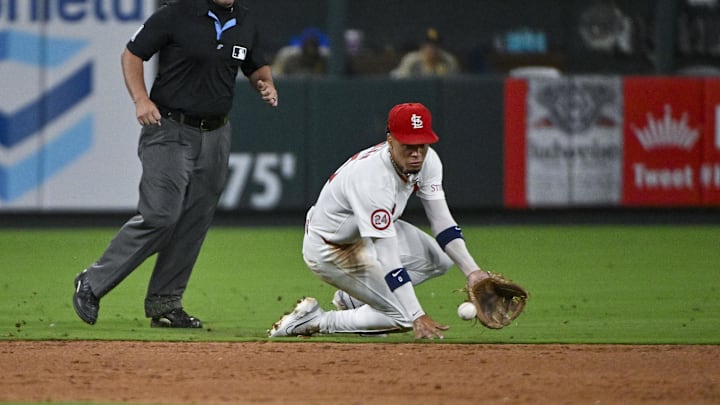 Aug 28, 2024; St. Louis, Missouri, USA;  St. Louis Cardinals shortstop Masyn Winn (0) fields a ground ball against the San Diego Padres during the eighth inning at Busch Stadium. Mandatory Credit: Jeff Curry-Imagn Images