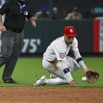 Aug 28, 2024; St. Louis, Missouri, USA;  St. Louis Cardinals shortstop Masyn Winn (0) fields a ground ball against the San Diego Padres during the eighth inning at Busch Stadium. Mandatory Credit: Jeff Curry-USA TODAY Sports