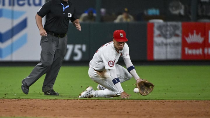 Aug 28, 2024; St. Louis, Missouri, USA;  St. Louis Cardinals shortstop Masyn Winn (0) fields a ground ball against the San Diego Padres during the eighth inning at Busch Stadium. Mandatory Credit: Jeff Curry-USA TODAY Sports