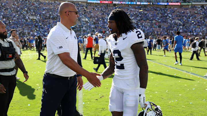 Penn State Nittany Lions head coach James Franklin greets cornerback Audavion Collins after the team's loss to the UCLA Bruins. Penn State Nittany Lions head coach James Franklin greets cornerback Audavion Collins after the team's loss to the UCLA Bruins.