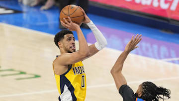 Jun 8, 2025; Pacers guard Tyrese Haliburton (0) shoots over OKC's Isaiah Joe during the 2025 NBA Finals at Paycom Center. Mandatory Credit: Kyle Terada-Imagn Images