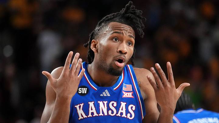 Kansas Jayhawks guard Darryn Peterson (22) looks to the referee after getting a foul called against him as they play the ASU Sun Devils at Desert Financial Arena in Tempe on March 3, 2026.