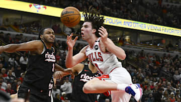 Apr 4, 2025; Chicago, Illinois, USA;  Chicago Bulls guard Josh Giddey (3) has the ball broken up by Portland Trail Blazers forward Jabari Walker (34) during the second half at the United Center. Mandatory Credit: Matt Marton-Imagn Images