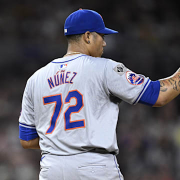 Aug 24, 2024; San Diego, California, USA; New York Mets relief pitcher Dedniel Nunez (72) tosses the rosin bag during the eighth inning against the San Diego Padres at Petco Park. Mandatory Credit: Orlando Ramirez-Imagn Images