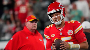 Oct 1, 2023; East Rutherford, New Jersey, USA; Kansas City Chiefs quarterback Patrick Mahomes (15) and Kansas City Chiefs head coach Andy Reid pre game against the Jets at MetLife Stadium. Mandatory Credit: Robert Deutsch-Imagn Images