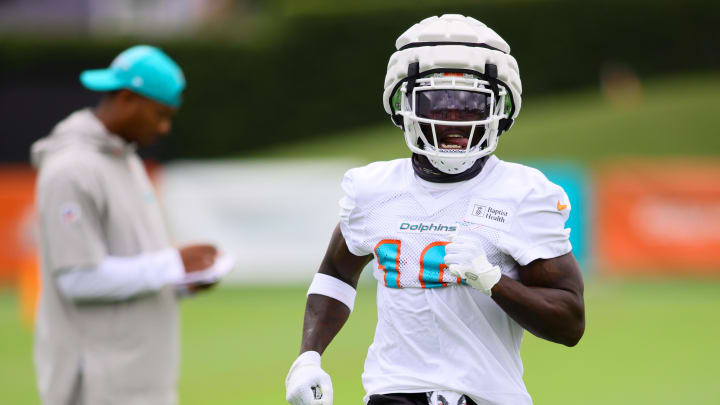 Miami Dolphins wide receiver Tyreek Hill (10) works out during training camp at Baptist Health Training Complex.