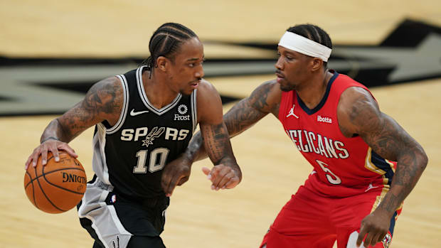 Feb 27, 2021; San Antonio, Texas, USA; San Antonio Spurs forward DeMar DeRozan (10) dribbles against the New Orleans Pelicans