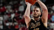 Purdue center Oscar Cluff (45) ices the game with free throws