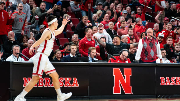 Nebraska Cornhuskers fans celebrate after a 3-pointer by guard Keisei Tominaga.