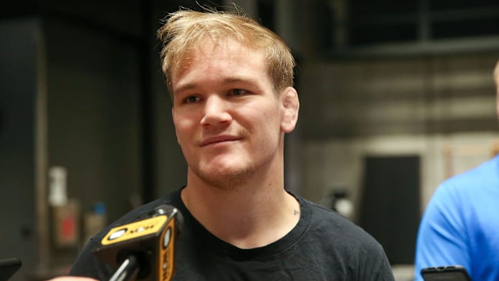 Nelson Brands has been named the new head wrestling coach at Iowa City Regina.