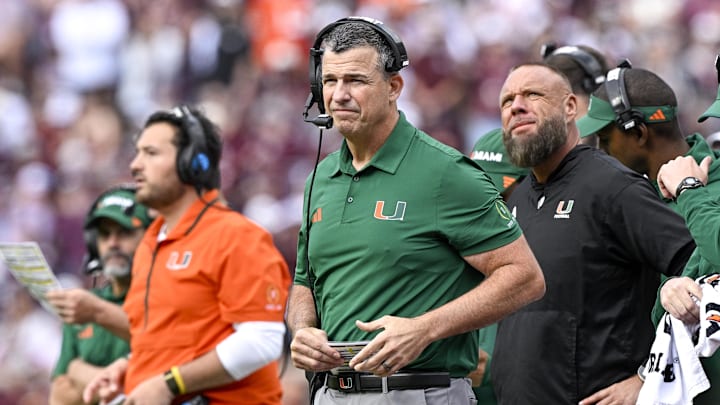 Dec 20, 2025; College Station, TX, USA; Miami Hurricanes head coach Mario Cristobal looks on during the game between the Aggies and the Hurricanes at Kyle Field. Mandatory Credit: Jerome Miron-Imagn Images