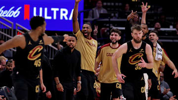 Jan 22, 2025; Houston, Texas, USA; Cleveland Cavaliers bench players react after a made basket by Cleveland Cavaliers forward Dean Wade (32) against the Houston Rockets during the fourth quarter at Toyota Center. Mandatory Credit: Erik Williams-Imagn Images