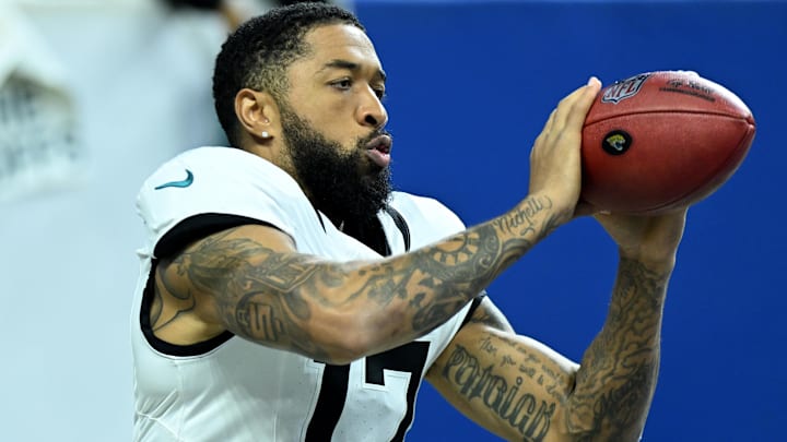 Dec 28, 2025; Indianapolis, Indiana, USA; Jacksonville Jaguars wide receiver Tim Patrick (17) warms up before a game against the Indianapolis Colts at Lucas Oil Stadium. 