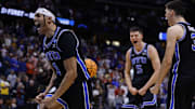 Mar 22, 2025; Denver, CO, USA; Brigham Young Cougars guard Trey Stewart (1) reacts after defeating the Wisconsin Badgers in the second round of the NCAA Tournament  at Ball Arena. Mandatory Credit: Isaiah J. Downing-Imagn Images