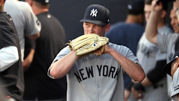 Apr 17, 2025; St. Petersburg, Florida, USA; New York Yankees starting pitcher Will Warren (98) reacts in the dugout as he left the game during the second inning against the Tampa Bay Rays at George M. Steinbrenner Field. 