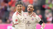 Hiroki Ito (l.) und Leroy Sane(r.) werden so bald nicht wieder gemeinsam auf dem Platz stehen