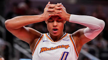 Phoenix Mercury forward Satou Sabally (0) holds her head Wednesday, July 30, 2025, during the game at Gainbridge Fieldhouse in Indianapolis. The Indiana Fever defeated the Phoenix Mercury, 107-101.