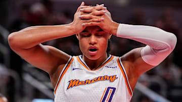 Phoenix Mercury forward Satou Sabally (0) holds her head Wednesday, July 30, 2025, during the game at Gainbridge Fieldhouse in Indianapolis. The Indiana Fever defeated the Phoenix Mercury, 107-101.