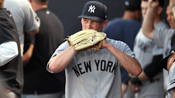 Apr 17, 2025; St. Petersburg, Florida, USA; New York Yankees starting pitcher Will Warren (98) reacts in the dugout as he left the game during the second inning against the Tampa Bay Rays at George M. Steinbrenner Field. 