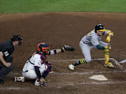 Oakland Athletics shortstop Jacob Wilson bunts in the 10th inning of Tuesday's 4-3 win over the Houston Astros at Minute Maid Park. 