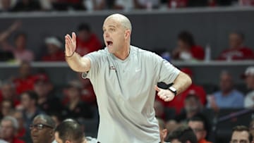 Feb 4, 2025; Houston, Texas, USA; Oklahoma State Cowboys head coach Steve Lutz reacts during the first half against the Houston Cougars at Fertitta Center. Mandatory Credit: Troy Taormina-Imagn Images