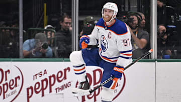 May 29, 2025; Dallas, Texas, USA; Edmonton Oilers center Connor McDavid (97) reacts after scoring a goal against the Dallas Stars during the second period in game five of the Western Conference Final of the 2025 Stanley Cup Playoffs at American Airlines Center. Mandatory Credit: Jerome Miron-Imagn Images