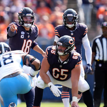 Chicago Bears quarterback Caleb Williams hollers out instructions to teammates during Sundays win over Tennessee.