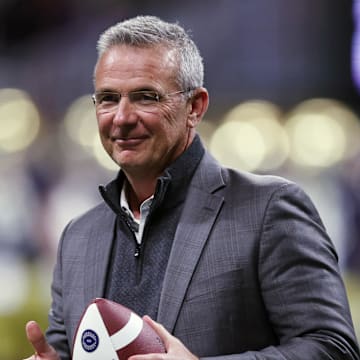 Jan 20, 2025; Atlanta, GA, USA; Urban Meyer looks on during the second half the CFP National Championship college football game at Mercedes-Benz Stadium. Mandatory Credit: Brett Davis-Imagn Images