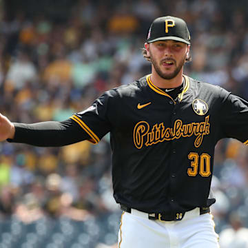 Jul 27, 2025; Pittsburgh, Pennsylvania, USA;  Pittsburgh Pirates starting pitcher Paul Skenes (30) reacts after pitching six scoreless innings against the Arizona Diamondbacks at PNC Park. Mandatory Credit: Charles LeClaire-Imagn Images