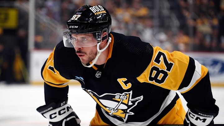 Apr 15, 2024; Pittsburgh, Pennsylvania, USA;  Pittsburgh Penguins center Sidney Crosby (87) before taking a face-off against the Nashville Predators during the first period at PPG Paints Arena. Mandatory Credit: Charles LeClaire-Imagn Images