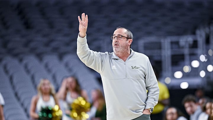 Mar 9, 2022; Fort Worth, TX, USA; South Florida Bulls head coach Jose Fernandez motions to his team during the first half of the American Athletic Conference women's basketball tournament semifinals against the Houston Cougars at Dickies Arena. Mandatory Credit: Jerome Miron-Imagn Images