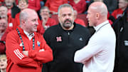 Nebraska Cornhuskers athletic director Troy Dannen, football coach Matt Rhule, and 1890 Nebraska's Matt Davison.