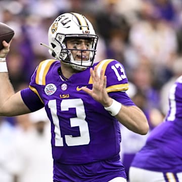 Dec 31, 2024; Houston, TX, USA; LSU Tigers quarterback Garrett Nussmeier (13) throws a pass during the first half against the Baylor Bears at NRG Stadium. The Tigers defeat the Bears 44-31. Mandatory Credit: Maria Lysaker-Imagn Images 