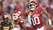 Aug 29, 2024; Little Rock, Arkansas, USA; Arkansas Razorbacks quarterback Taylen Green (10) rushes for a touchdown in the second quarter against the Pine Bluff Golden Lions at War Memorial Stadium. Mandatory Credit: Nelson Chenault-USA TODAY Sports