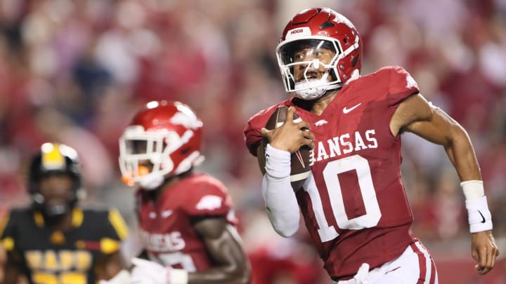 Aug 29, 2024; Little Rock, Arkansas, USA; Arkansas Razorbacks quarterback Taylen Green (10) rushes for a touchdown in the second quarter against the Pine Bluff Golden Lions at War Memorial Stadium. Mandatory Credit: Nelson Chenault-USA TODAY Sports