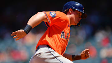  Houston Astros center fielder Jake Meyers (6) runs home to score against the Los Angeles Angels during the fifth inning at Angel Stadium.