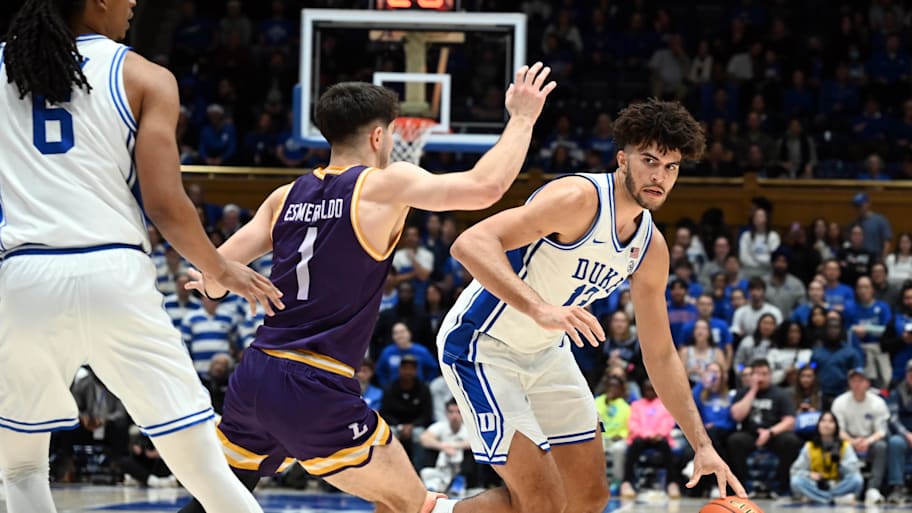 Duke's Cam Boozer dribbles the ball