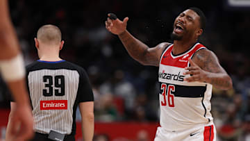 Feb 26, 2025; Washington, District of Columbia, USA; Washington Wizards guard Marcus Smart (36) reacts after being whistled for a technical foul by referee Tyler Ford (39) against the Portland Trail Blazers late in the second half at Capital One Arena. Mandatory Credit: Geoff Burke-Imagn Images