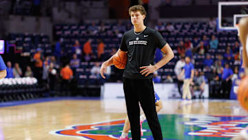 Jan 25, 2025; Gainesville, Florida, USA; Florida Gators center Micah Handlogten (3) watches warmups before a game against the Georgia Bulldogs at Exactech Arena at the Stephen C. O'Connell Center. Mandatory Credit: Matt Pendleton-Imagn Images