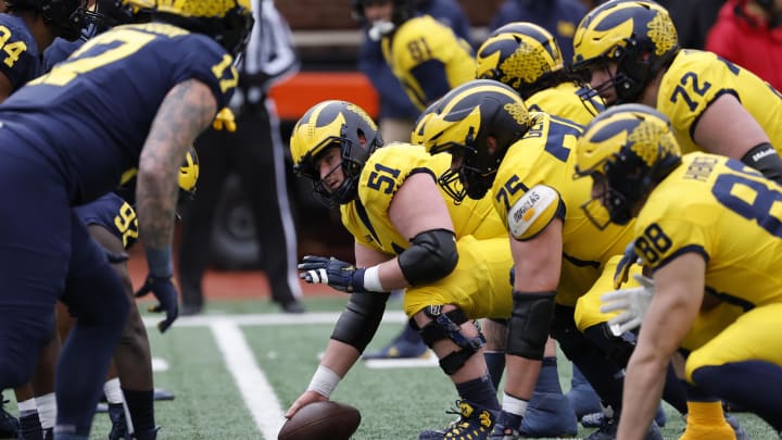 Apr 1, 2023; Ann Arbor, MI, USA; Michigan Wolverines offensive lineman Greg Crippen (51) prepares to snap during the Spring Game at Michigan Stadium. Mandatory Credit: Rick Osentoski-USA TODAY Sports