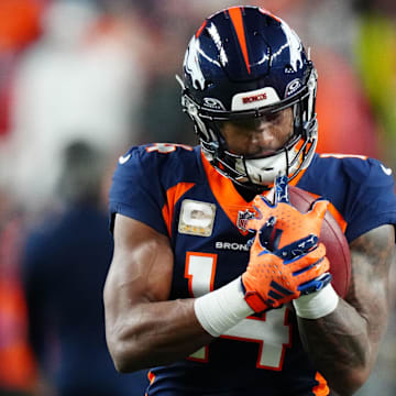 Nov 19, 2023; Denver, Colorado, USA; Denver Broncos wide receiver Courtland Sutton (14) practices before the game against the Minnesota Vikings at Empower Field at Mile High. Mandatory Credit: Ron Chenoy-Imagn Images