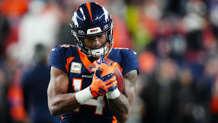 Nov 19, 2023; Denver, Colorado, USA; Denver Broncos wide receiver Courtland Sutton (14) practices before the game against the Minnesota Vikings at Empower Field at Mile High. Mandatory Credit: Ron Chenoy-Imagn Images