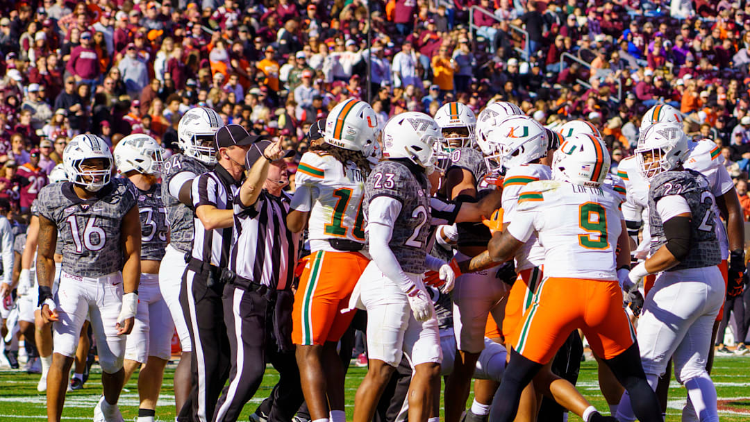Nov 22, 2025; Blacksburg, Virginia, USA; late second quarter a fight breaks out between Miami (FL) Hurricanes and Virginia Tech Hokies at Lane Stadium. Mandatory Credit: Neville E. Guard-Imagn Images