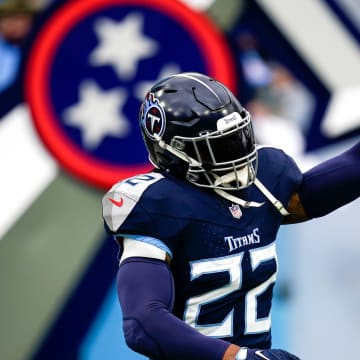 Tennessee Titans running back Derrick Henry (22) waves to fans as he is introduced before a game against the Jacksonville Jaguars at Nissan Stadium in Nashville, Tenn., Sunday, Jan. 7, 2024.