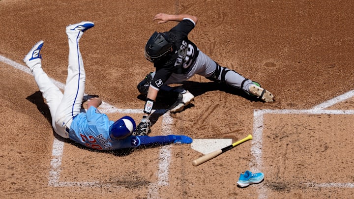 Michael Busch, Matt Thaiss - Chicago White Sox v Chicago Cubs