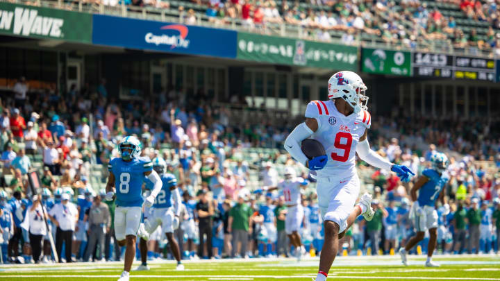 Sep 9, 2023; New Orleans, Louisiana, USA;   Mississippi Rebels wide receiver Tre Harris (9) catches a pass for a touchdown against the Tulane Green Wave during the first half at Yulman Stadium. Mandatory Credit: Stephen Lew-USA TODAY Sports