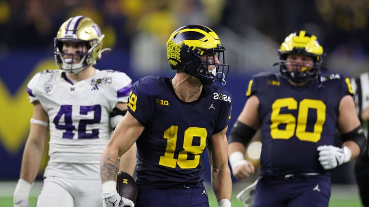 Jan 8, 2024; Houston, TX, USA; Michigan Wolverines tight end Colston Loveland (18) celebrates after making a catch against the Washington Huskies during the fourth quarter in the 2024 College Football Playoff national championship game at NRG Stadium. Mandatory Credit: Thomas Shea-USA TODAY Sports